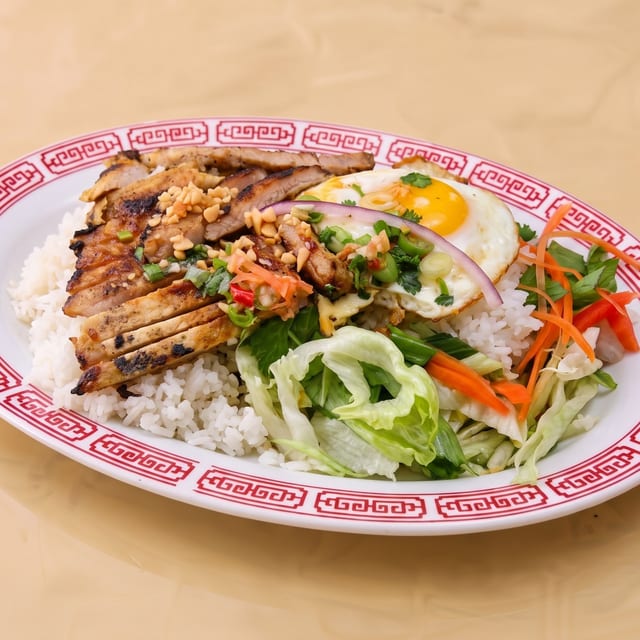 Grilled Lemongrass Pork Chop Rice Plate.