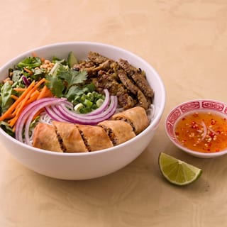 V1. Grilled Lemongrass Sliced Beef and Egg Roll Vermicelli Bowl