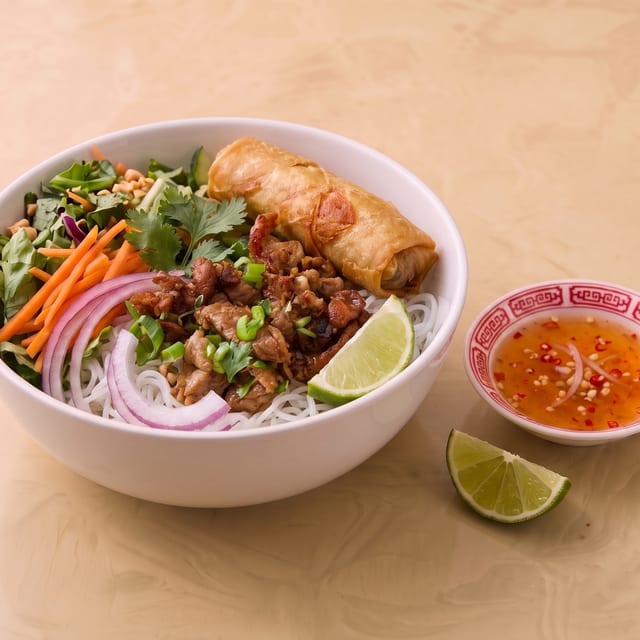 Grilled Pork and Egg Rolls Vermicelli Bowl.